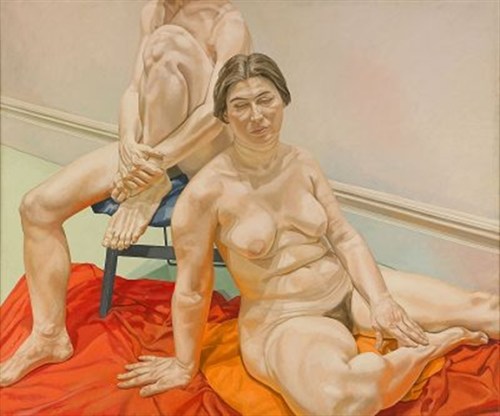 picture1 Seated models on red and orange drapes