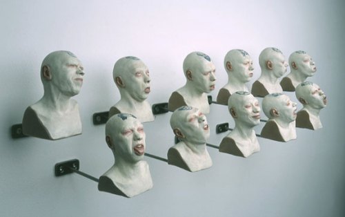 Choir 2005 Pigmented wax, oil paint, and metal brackets 5" x 24" x 7" 