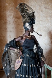 Signare posing in traditional dress
